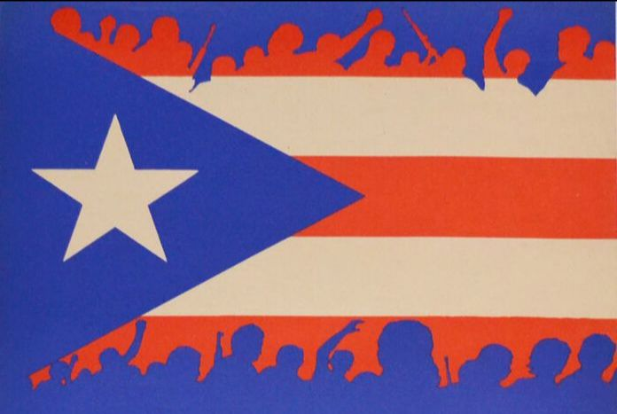 Image from a 1973 poster. Shape of the Puerto Rican flag, red and white horizontal stripes, a blue triangle with a white star--there are silhouettes of protesters in red (above) and blue (below) blending into the flag